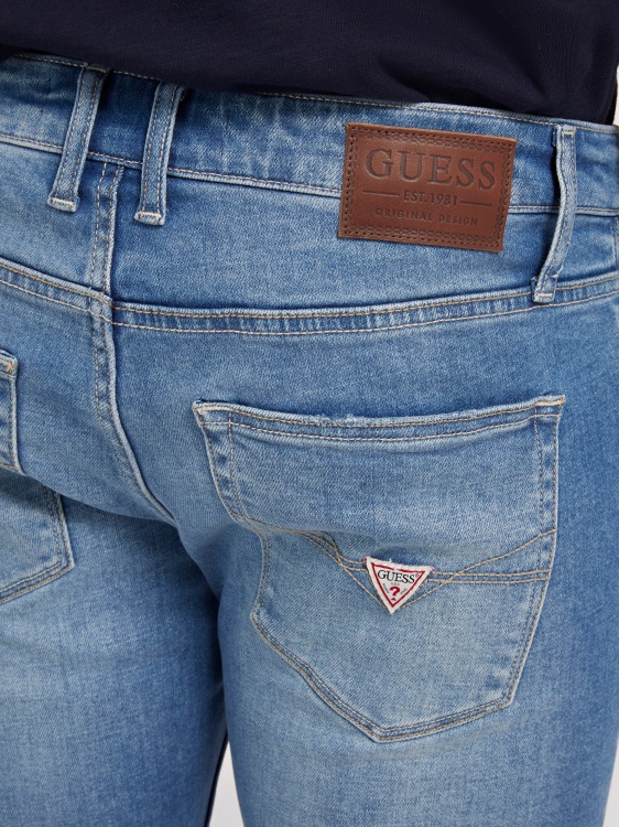 прилепнали дънкови панталони Guess нова тенденция