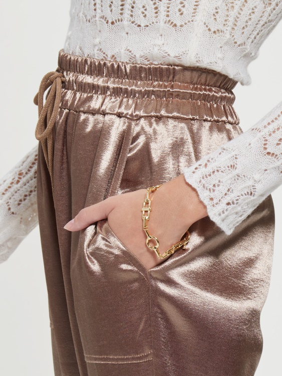 златист тон превключваща гривна Guess Gold